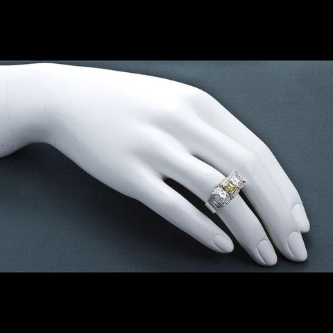 0.87 Carat Fancy Intense Yellow Emerald-cut Diamond Platinum Ring GIA - 1510 - TMW Jewels Co.